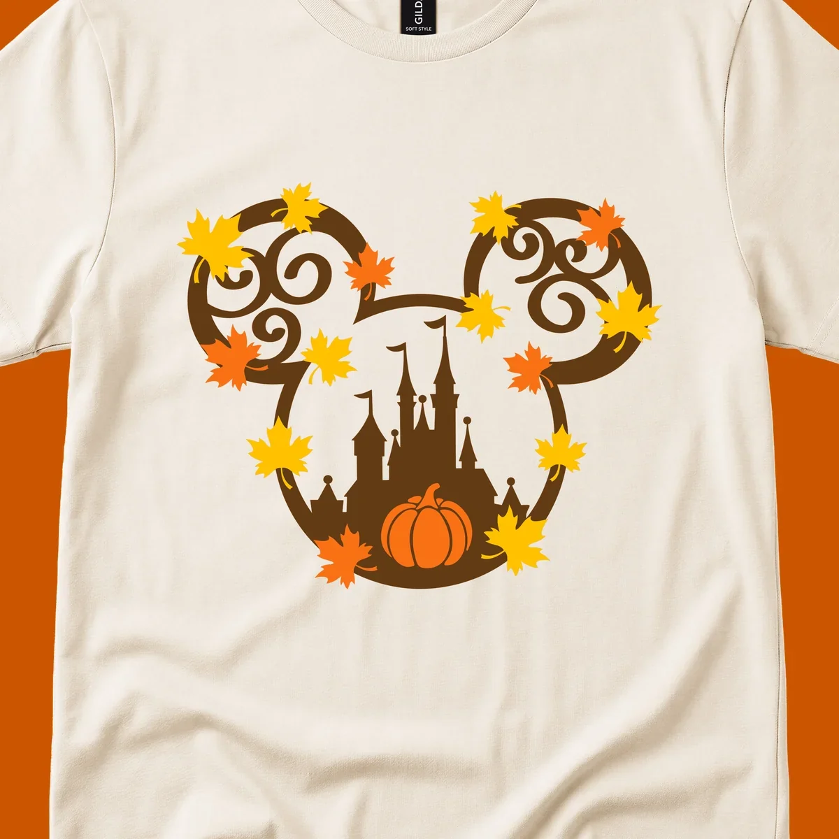 Autumn mickey castle graphic with pumpkin and maple leaves.
