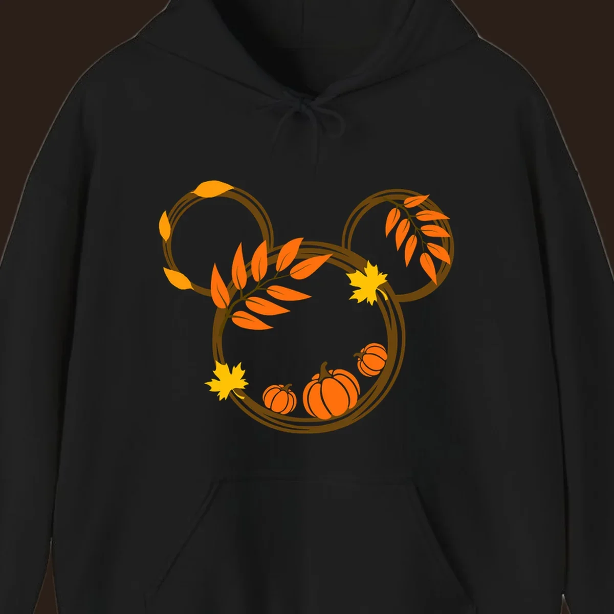 Mickey autumn leaves and pumpkins graphic with branches and pumpkins.