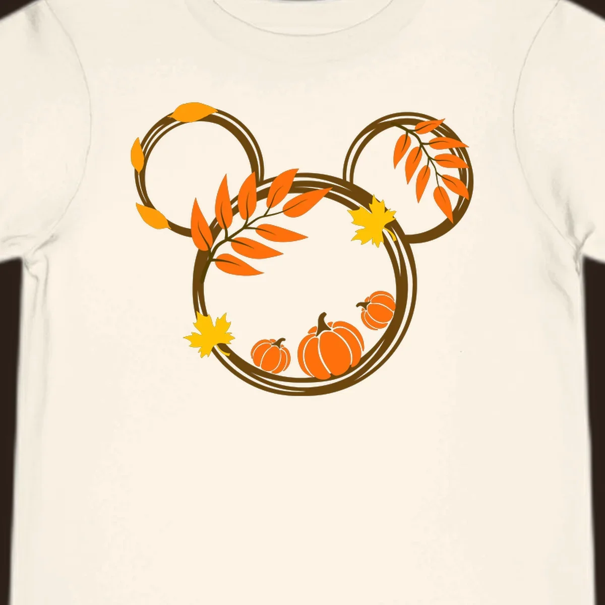 Mickey autumn leaves and pumpkins graphic with branches and pumpkins.