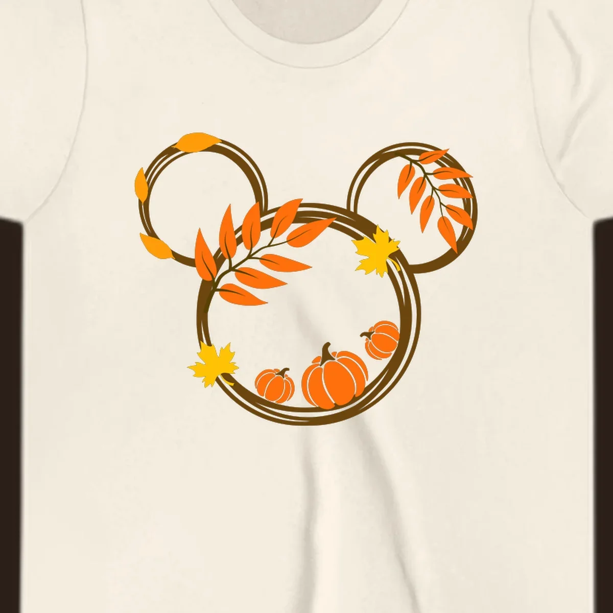 Mickey autumn leaves and pumpkins graphic with branches and pumpkins.