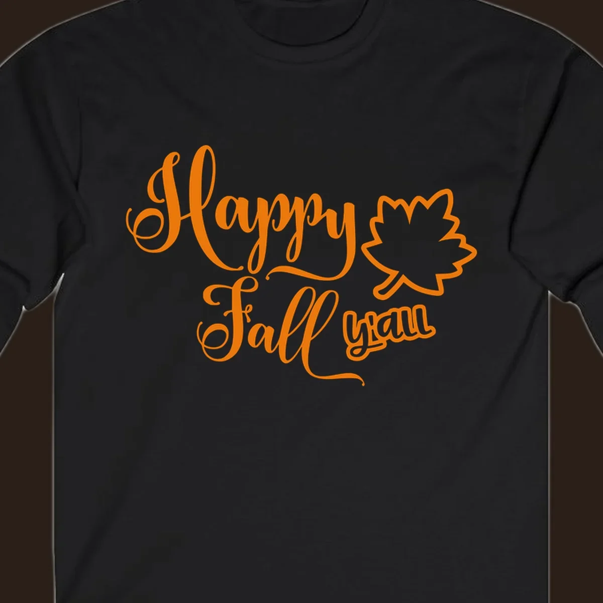 Happy Fall y'all text with autumn leaf outline for Thanksgiving shirts.