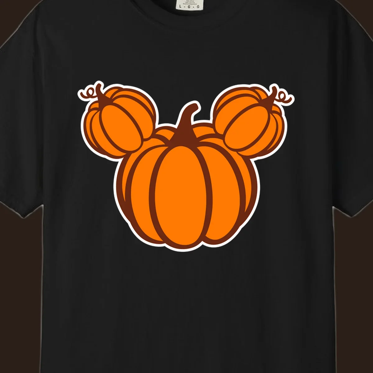 Mickey pumpkin head graphic with orange pumpkins and brown outlines.