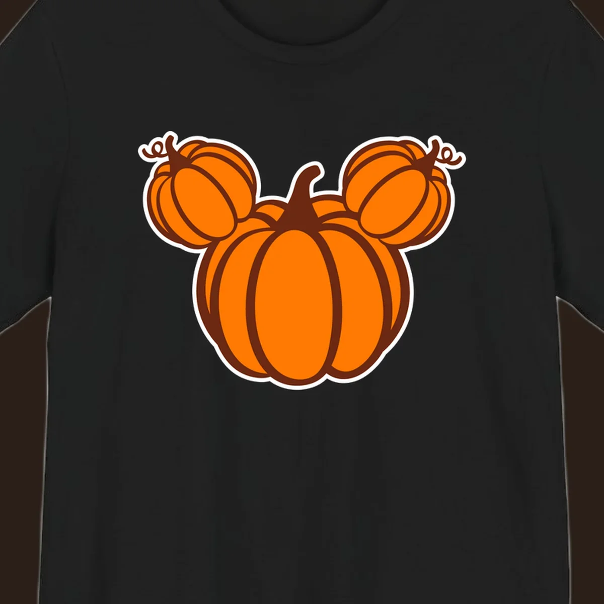 Mickey pumpkin head graphic with orange pumpkins and brown outlines.
