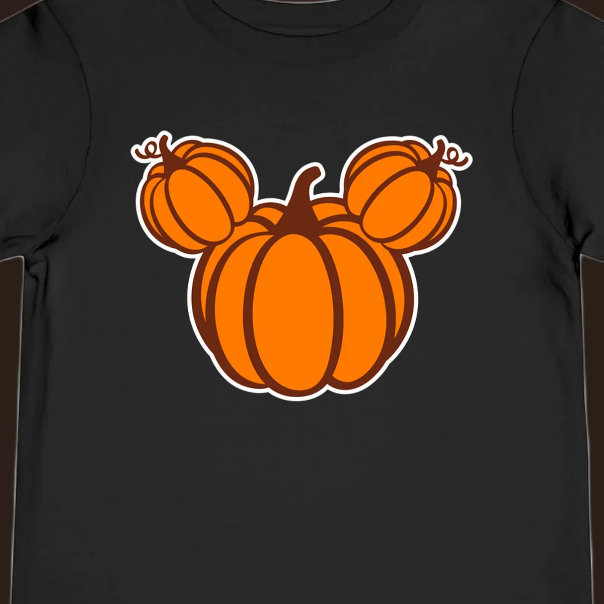 Mickey pumpkin head graphic with orange pumpkins and brown outlines.