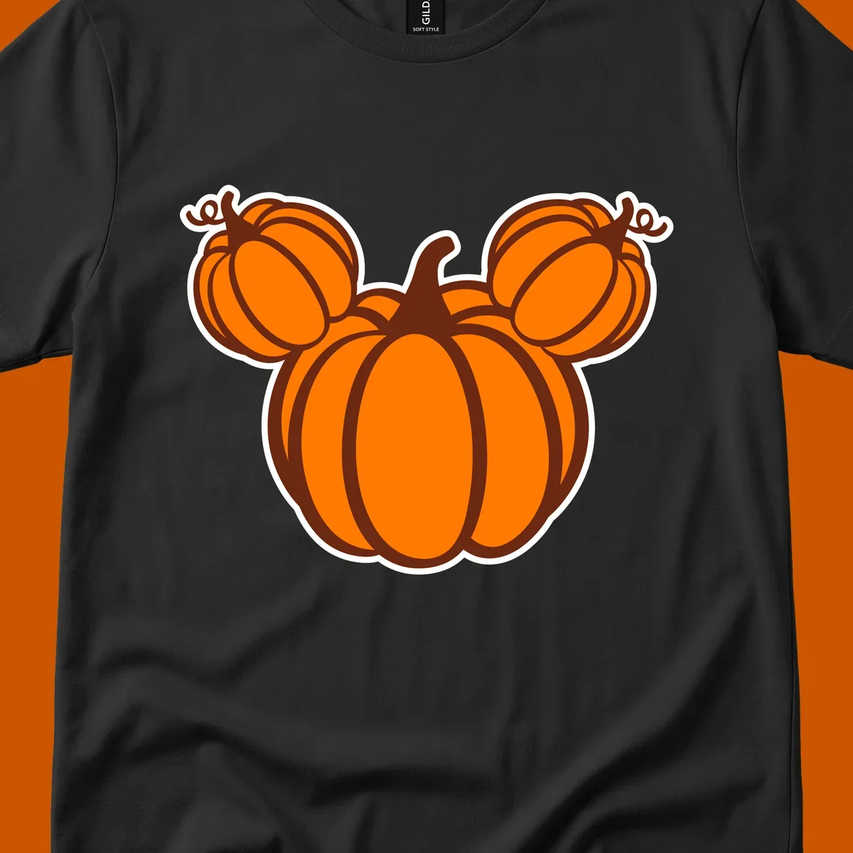 Mickey pumpkin head graphic with orange pumpkins and brown outlines.