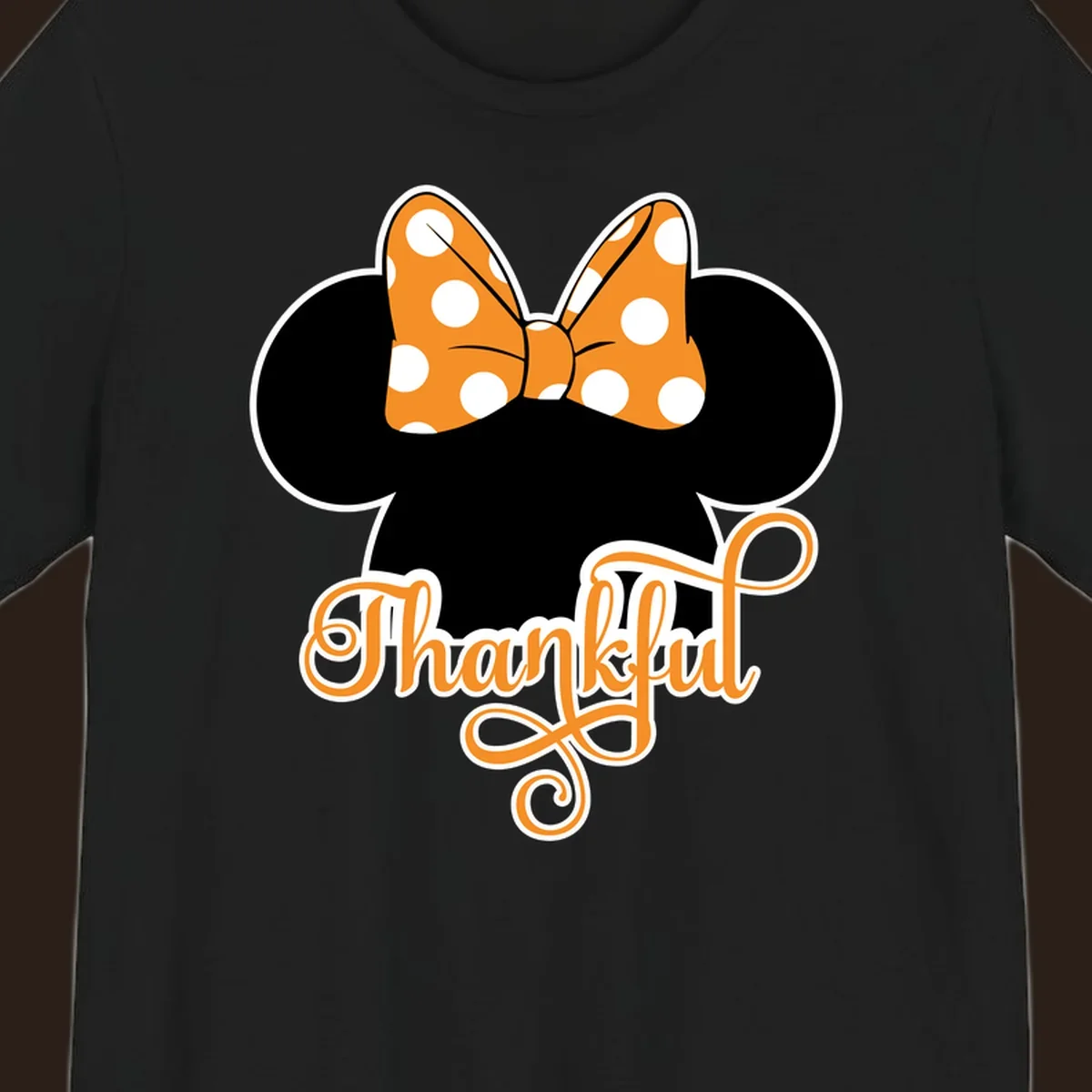 Minnie Mouse ears with orange polka dot bow and "Thankful" text, perfect for Thanksgiving.