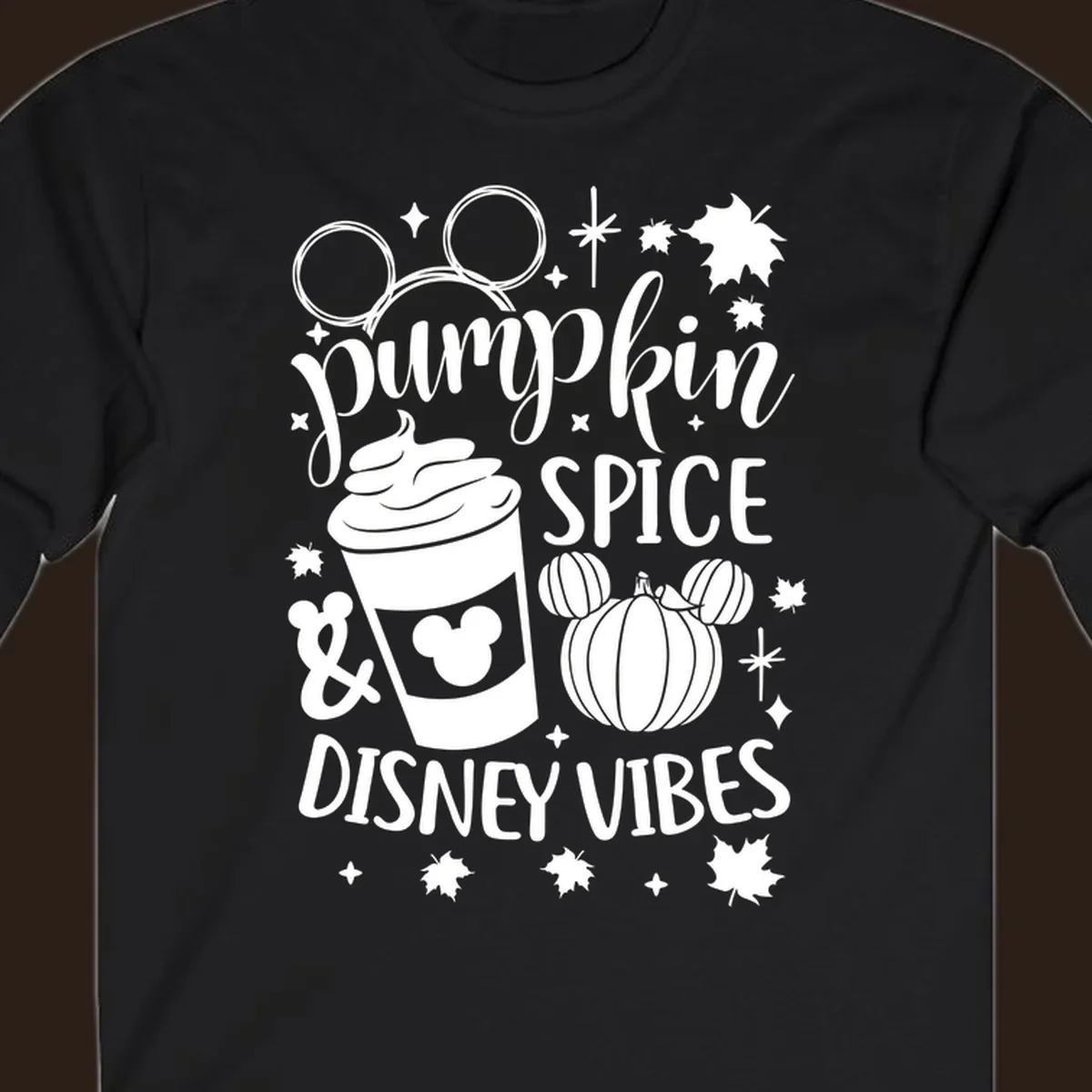 Pumpkin spice and Disney vibes text with Mickey ears, coffee cup, and pumpkin graphic. Pumpkin-spice-disney.