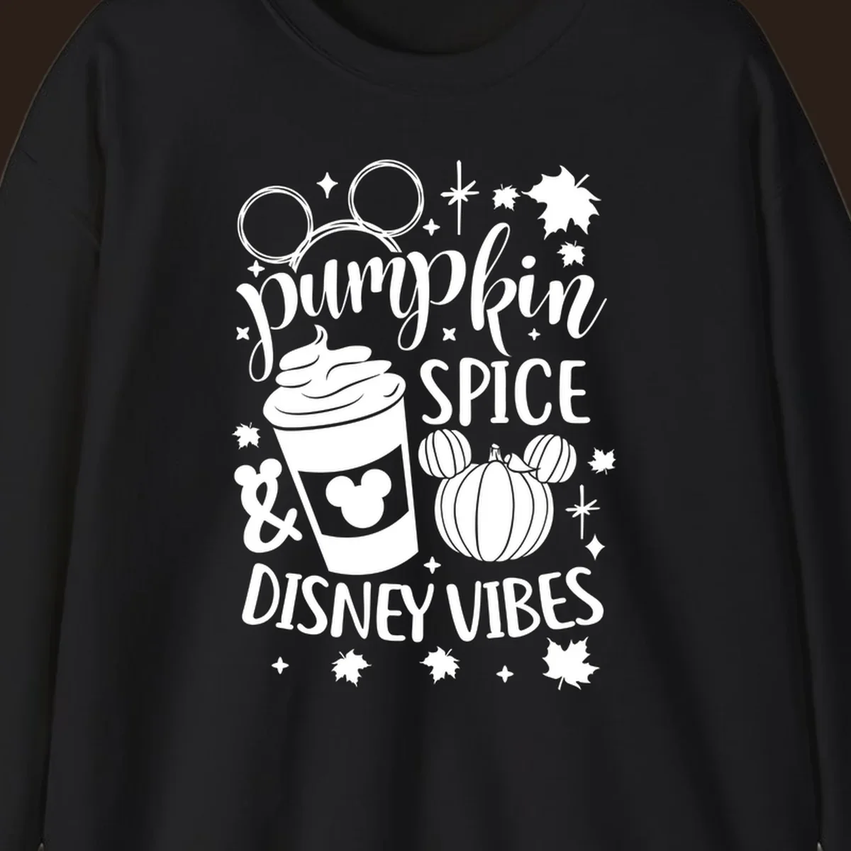 Pumpkin spice and Disney vibes text with Mickey ears, coffee cup, and pumpkin graphic. Pumpkin-spice-disney.