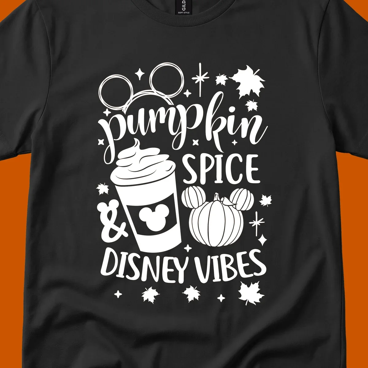 Pumpkin spice and Disney vibes text with Mickey ears, coffee cup, and pumpkin graphic. Pumpkin-spice-disney.
