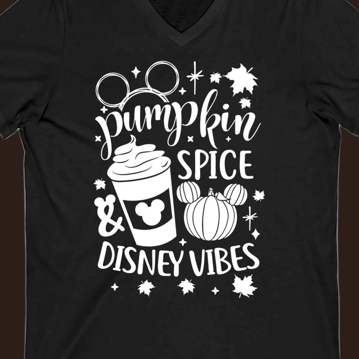 Pumpkin spice and Disney vibes text with Mickey ears, coffee cup, and pumpkin graphic. Pumpkin-spice-disney.