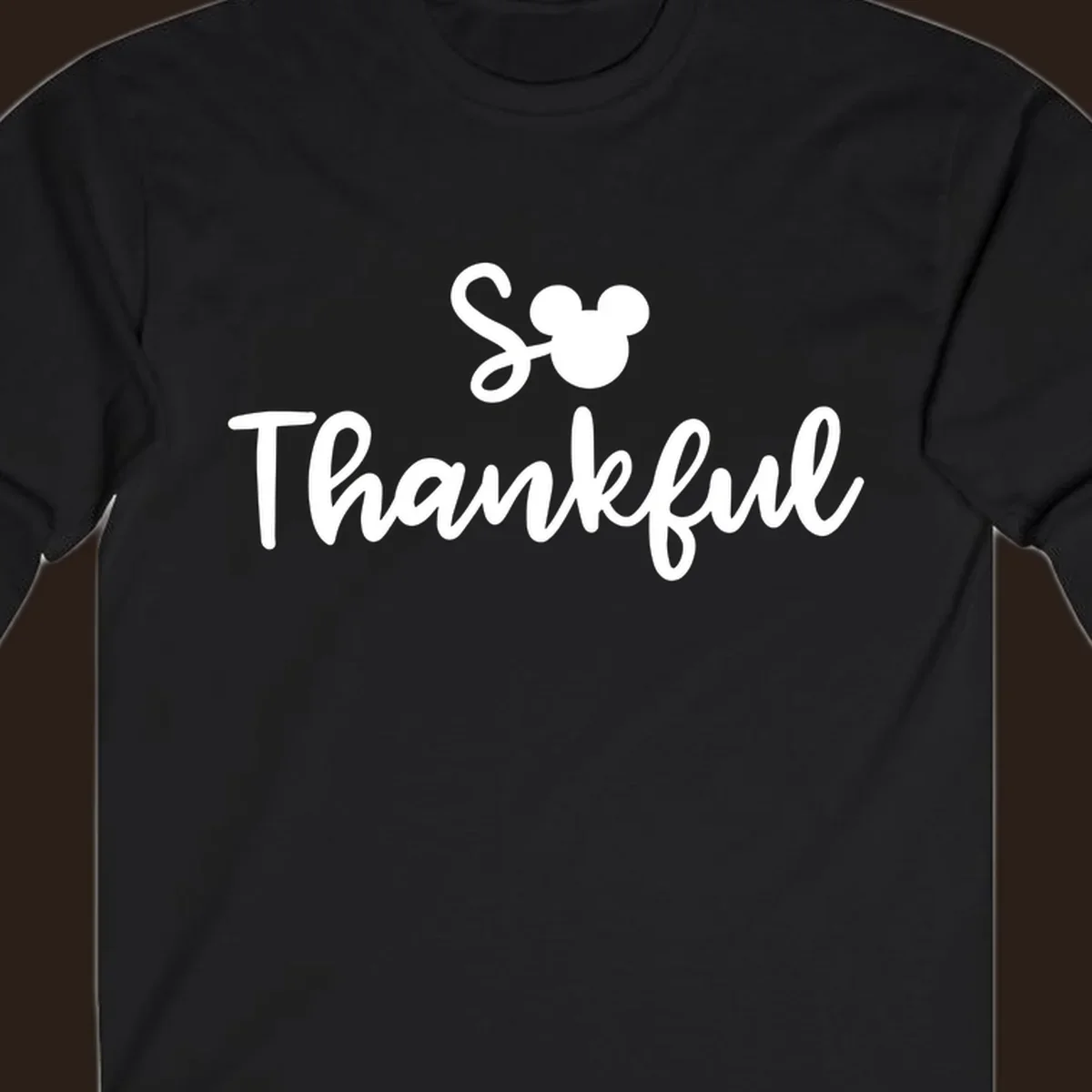Disney Thanksgiving 'So Thankful' text with Mickey Mouse ears.