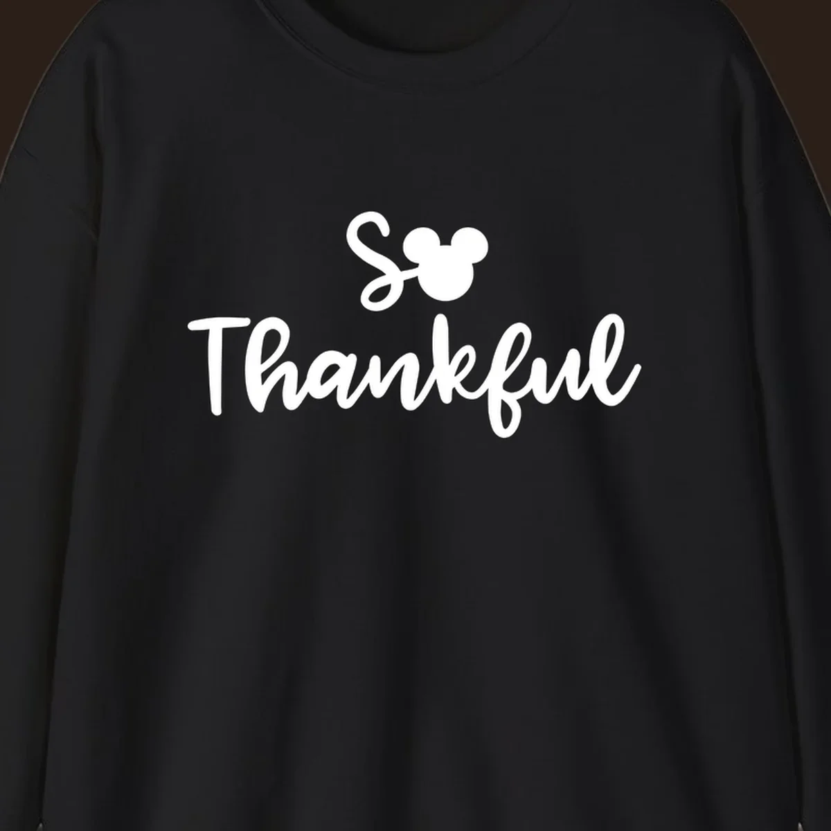 Disney Thanksgiving 'So Thankful' text with Mickey Mouse ears.