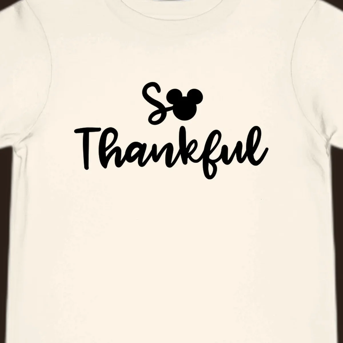 Disney Thanksgiving 'So Thankful' text with Mickey Mouse ears.