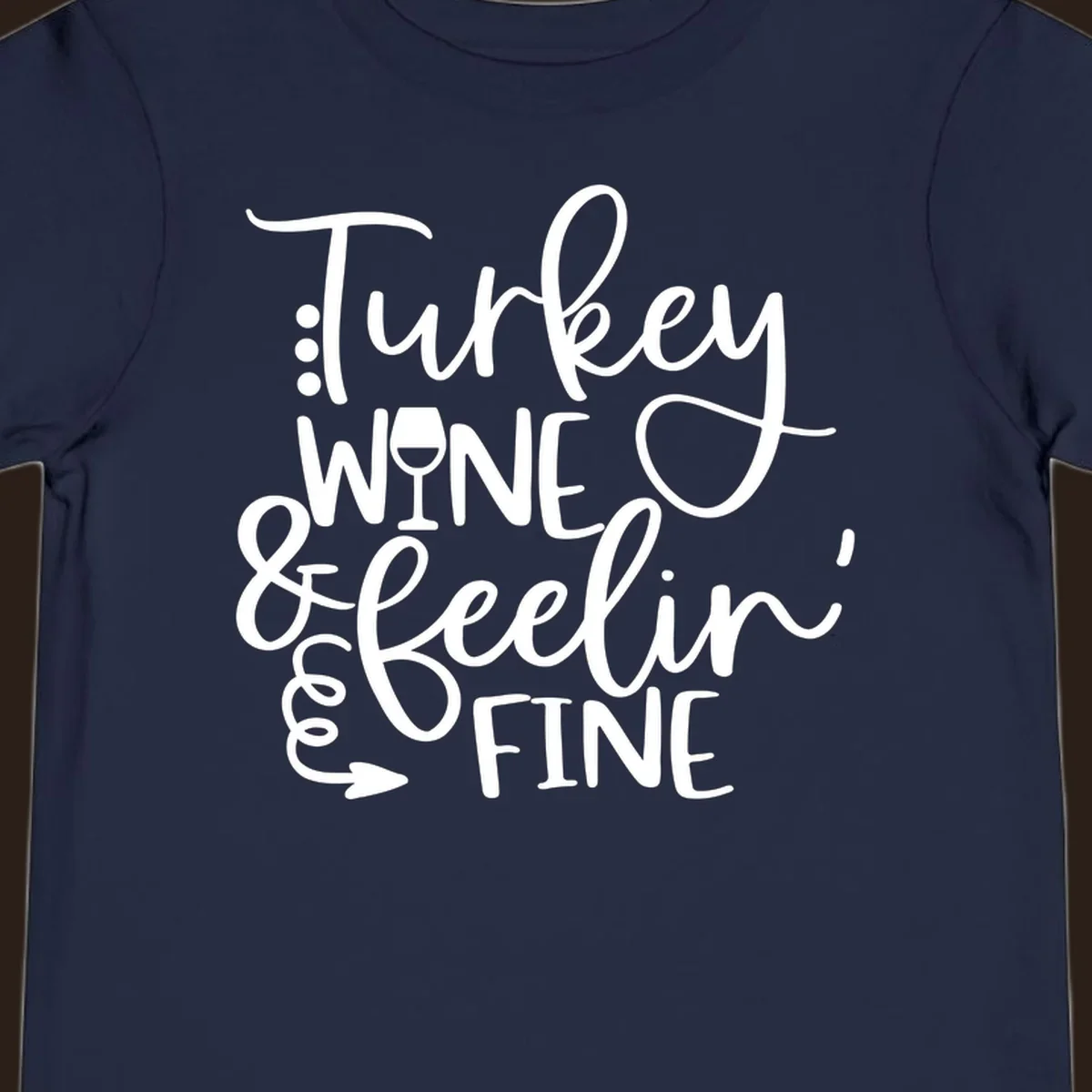 Turkey wine and feelin fine Thanksgiving design with stylized text and a wine glass.