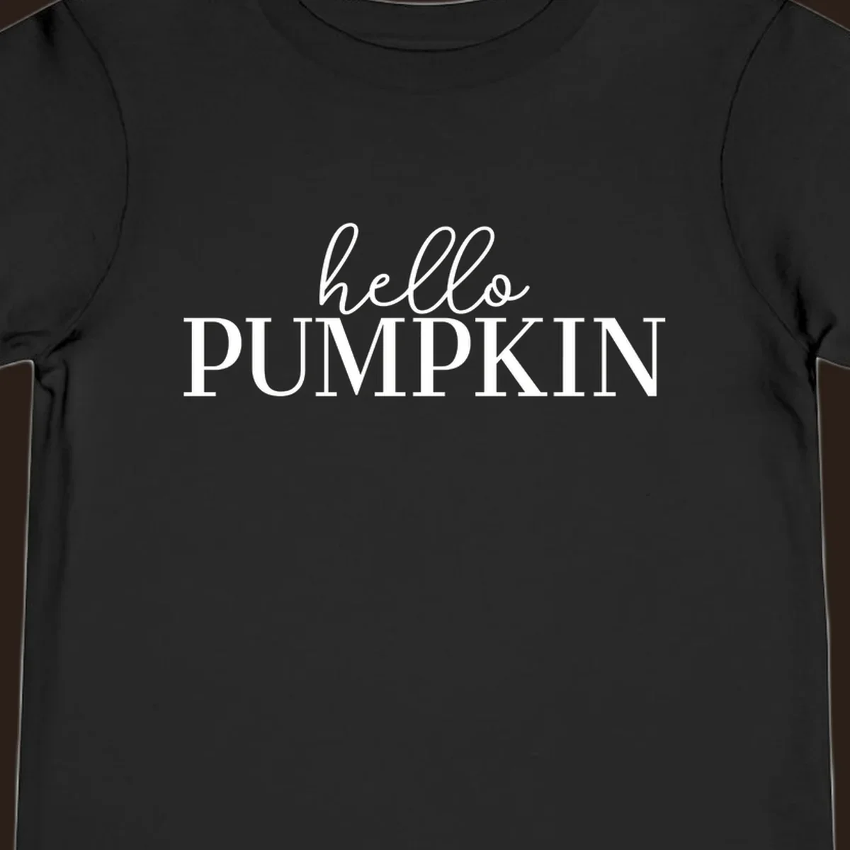 White text that says 'hello PUMPKIN' on a black background, perfect for Thanksgiving.