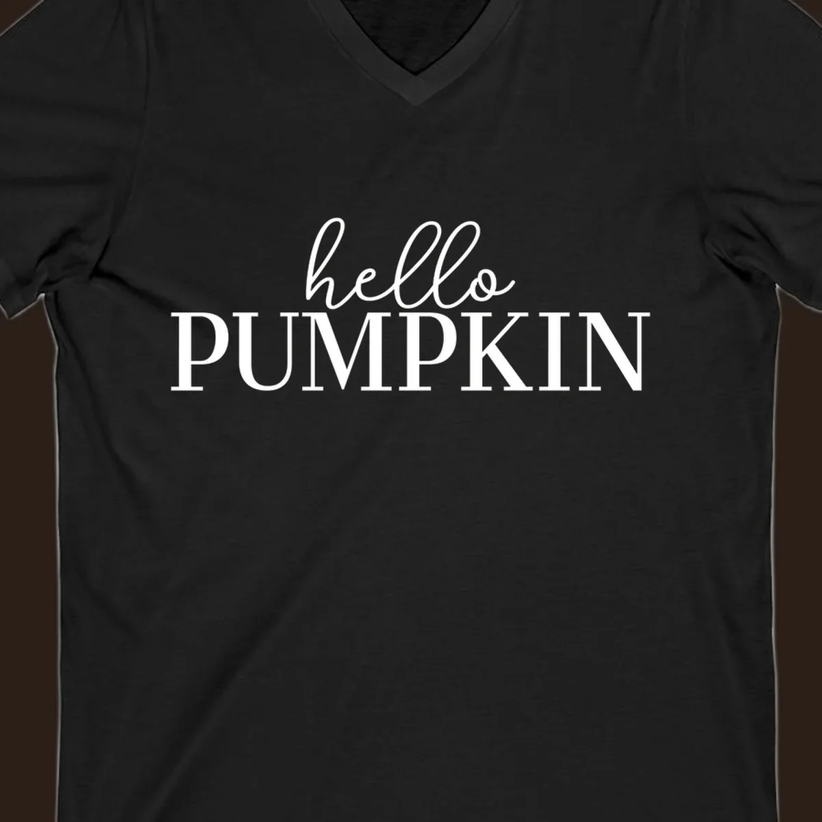 White text that says 'hello PUMPKIN' on a black background, perfect for Thanksgiving.