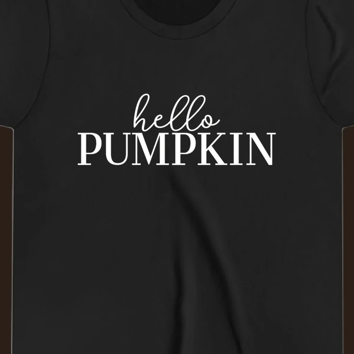 White text that says 'hello PUMPKIN' on a black background, perfect for Thanksgiving.