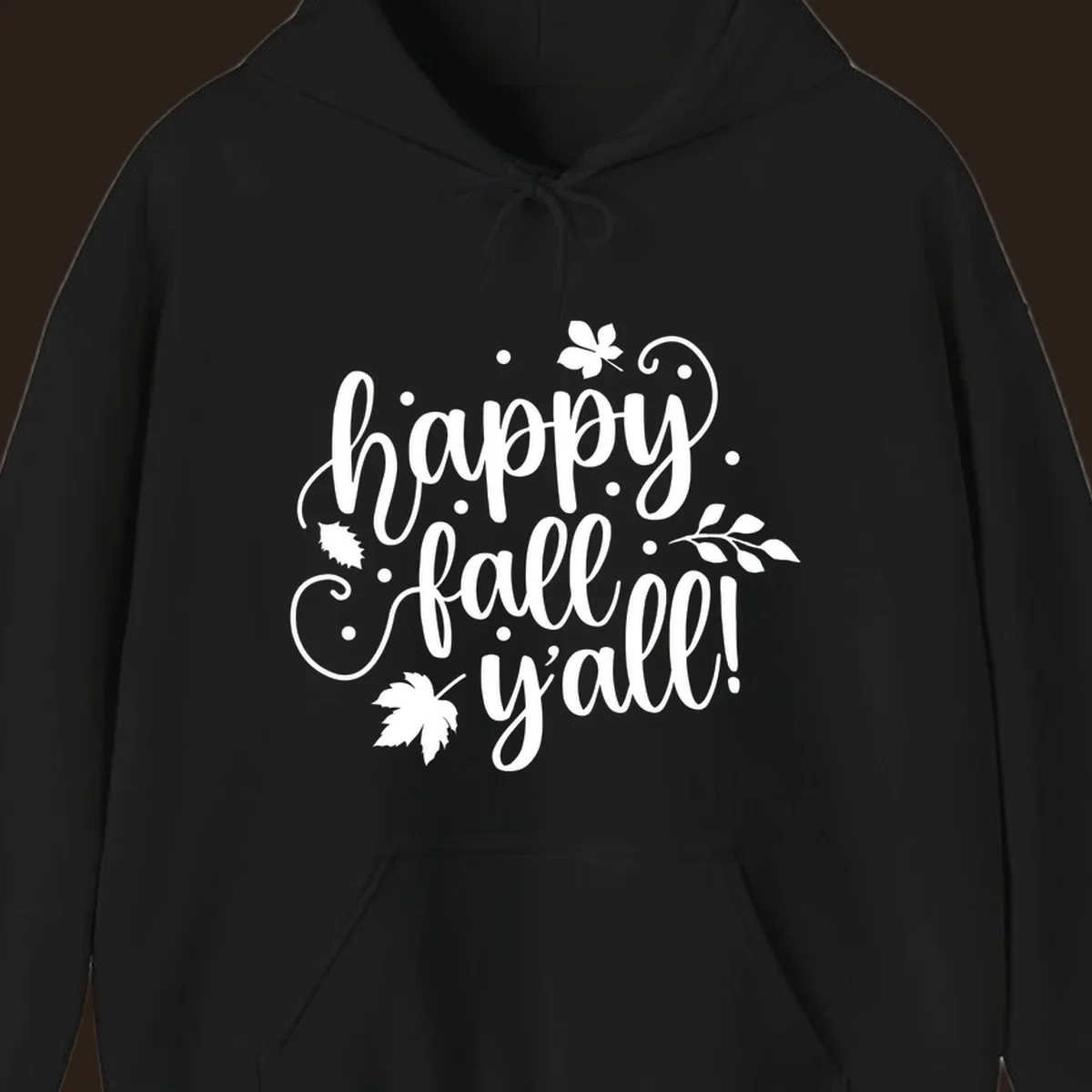 Happy Fall Y'all script design with maple leaves and swirls.