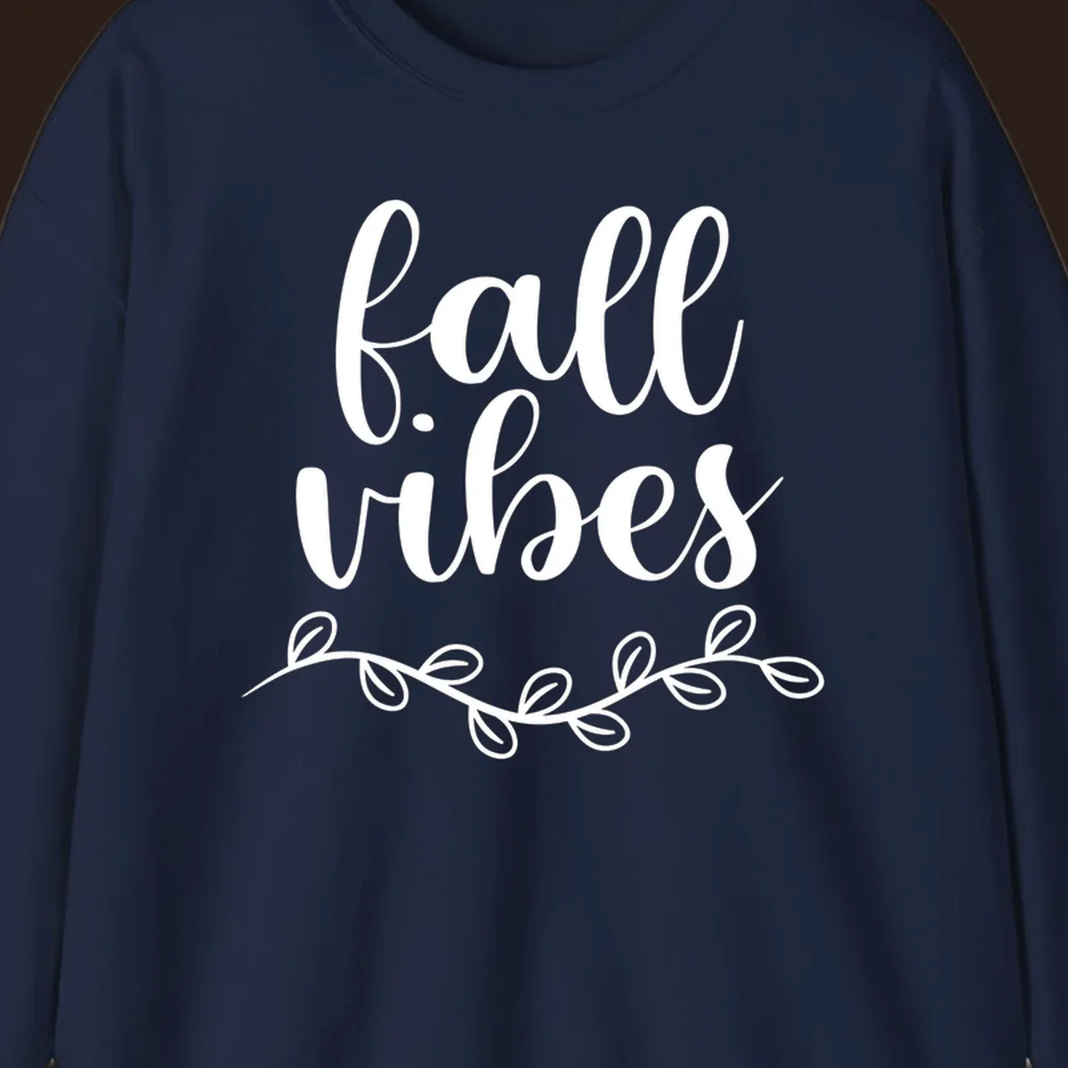 Fall vibes script typography with leaves design