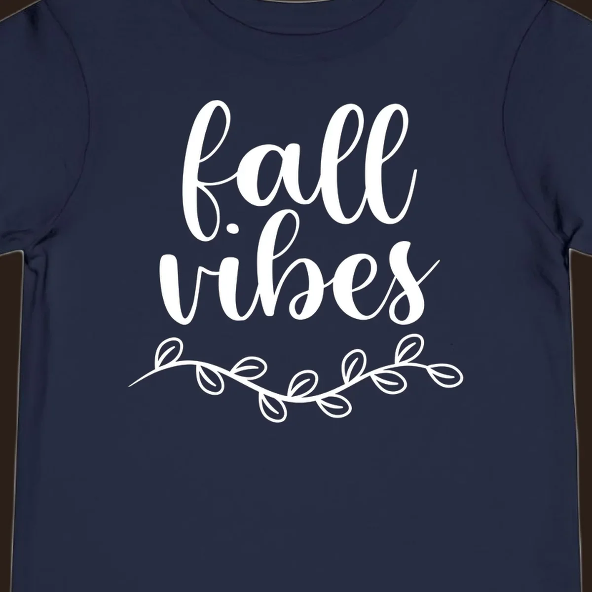 Fall vibes script typography with leaves design