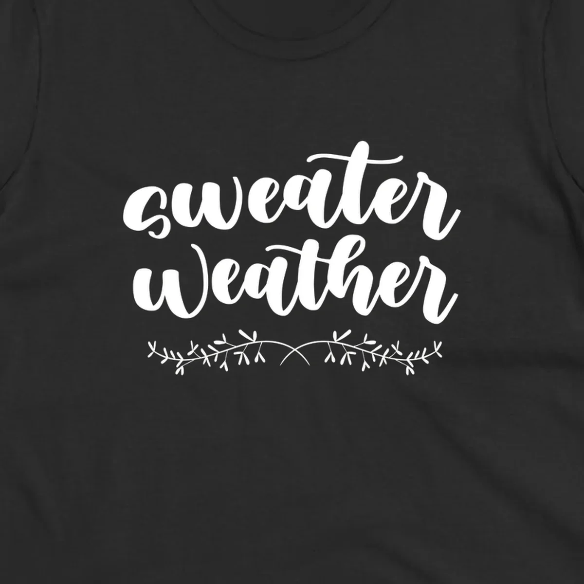 Sweater Weather text in white script font with leafy vine accent.