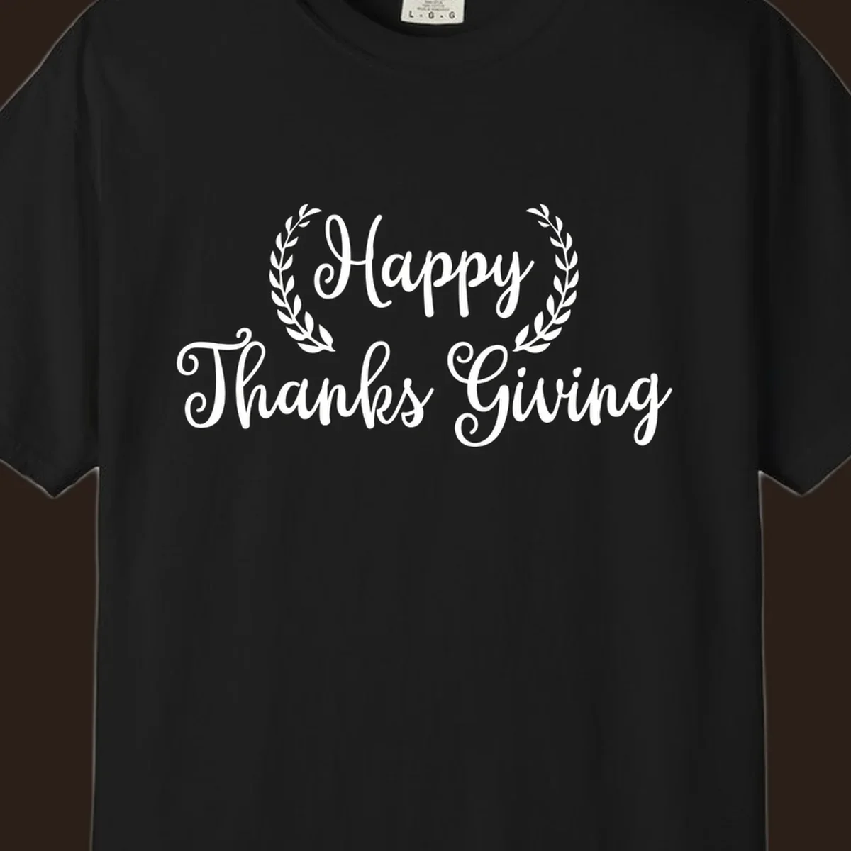 Happy Thanksgiving text with a laurel wreath, in white on black and black on white.