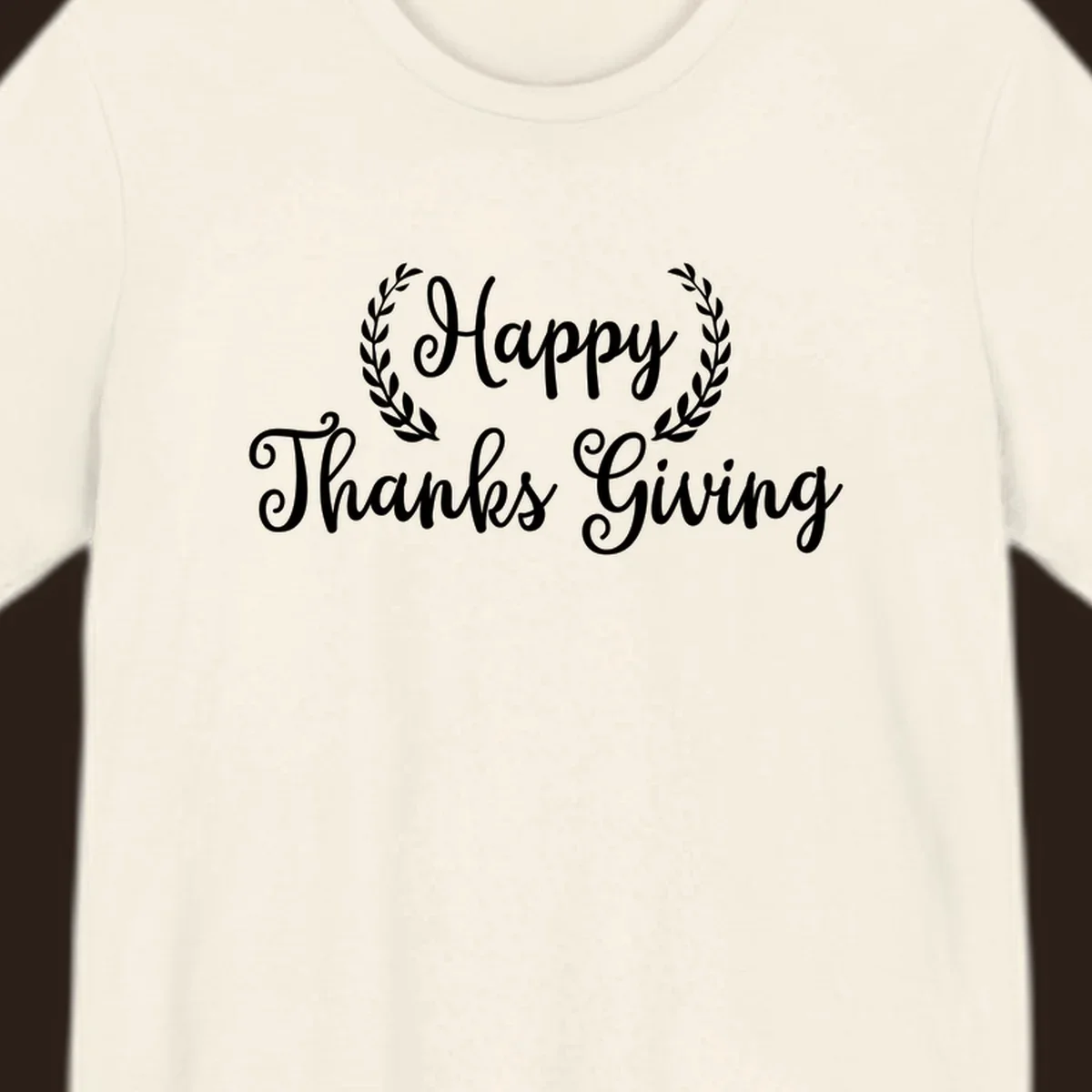 Happy Thanksgiving text with a laurel wreath, in white on black and black on white.