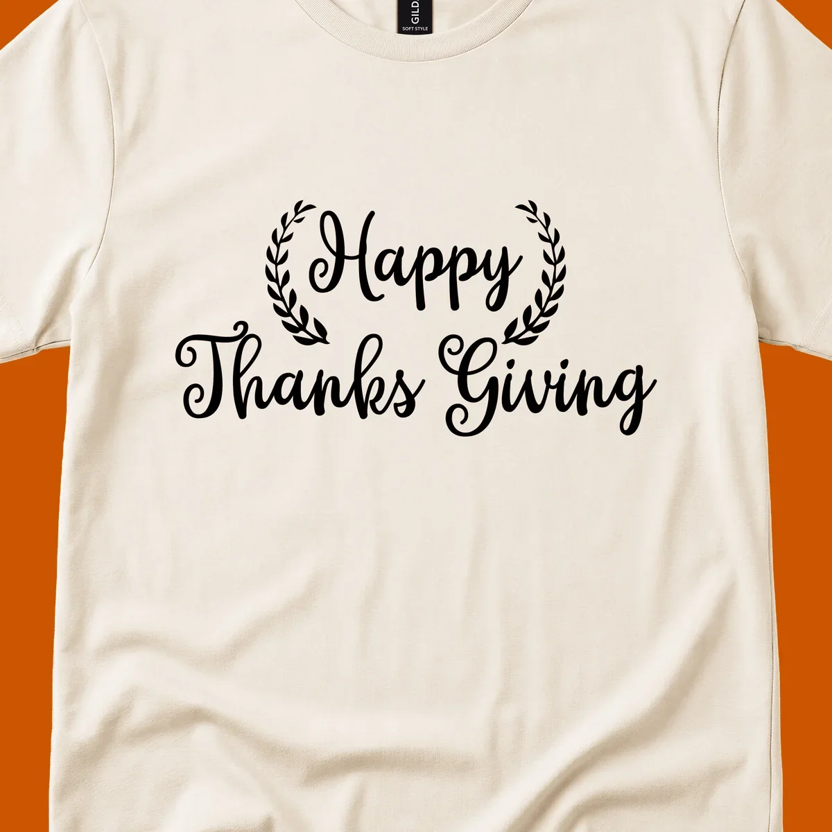 Happy Thanksgiving text with a laurel wreath, in white on black and black on white.