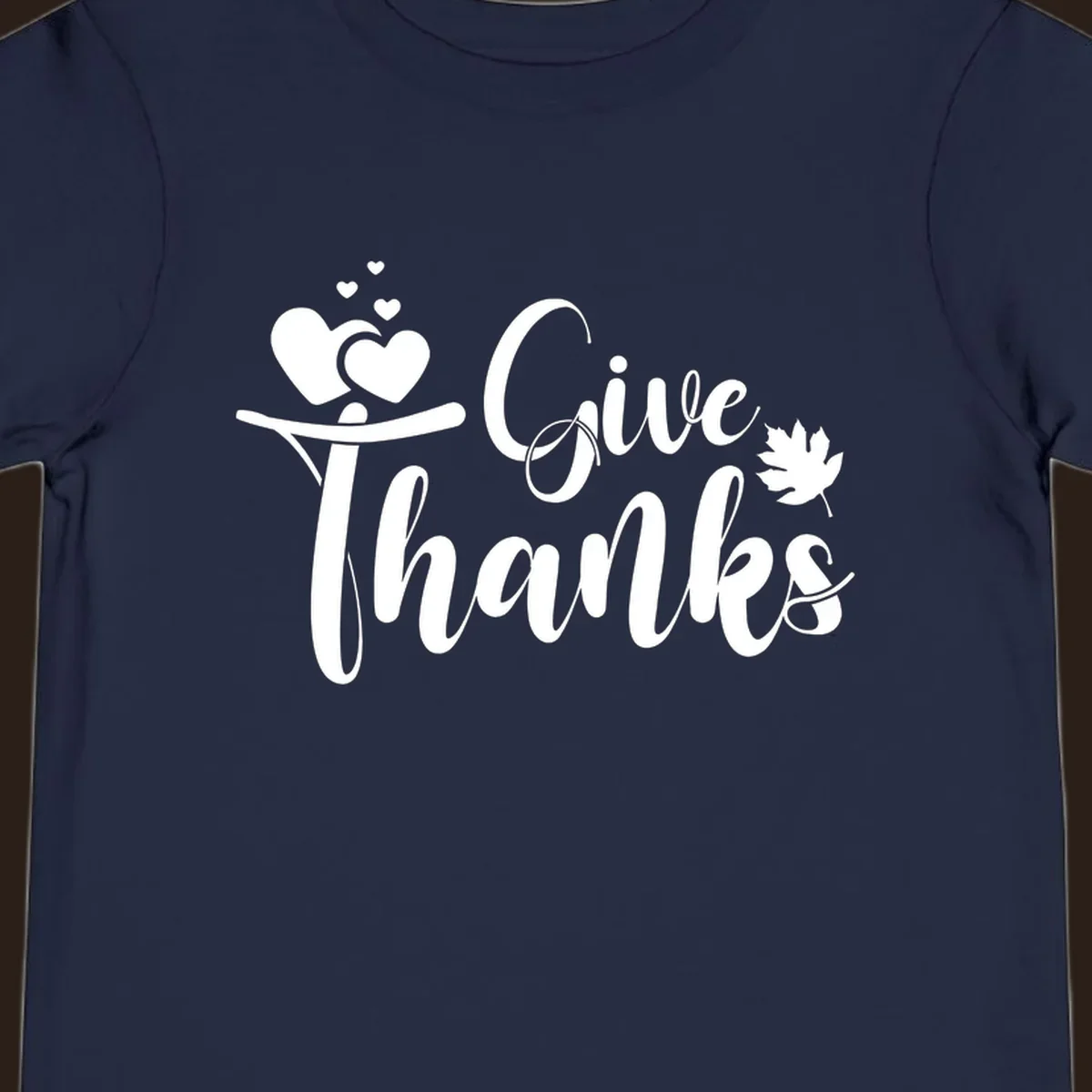 Give Thanks Thanksgiving family design with hearts and maple leaf.
