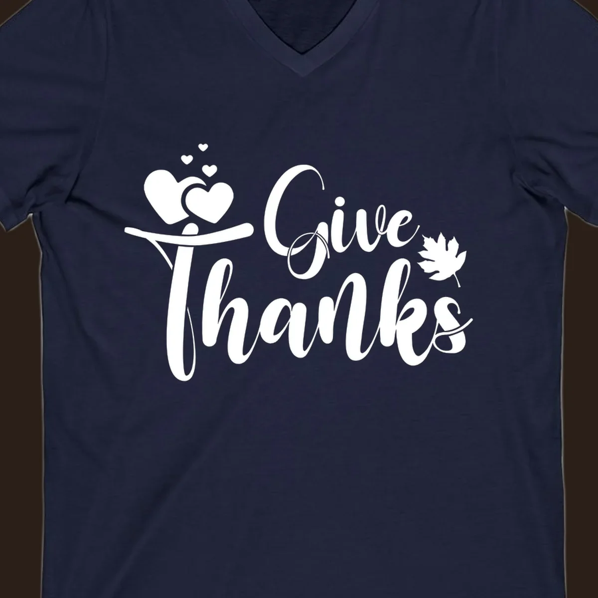 Give Thanks Thanksgiving family design with hearts and maple leaf.