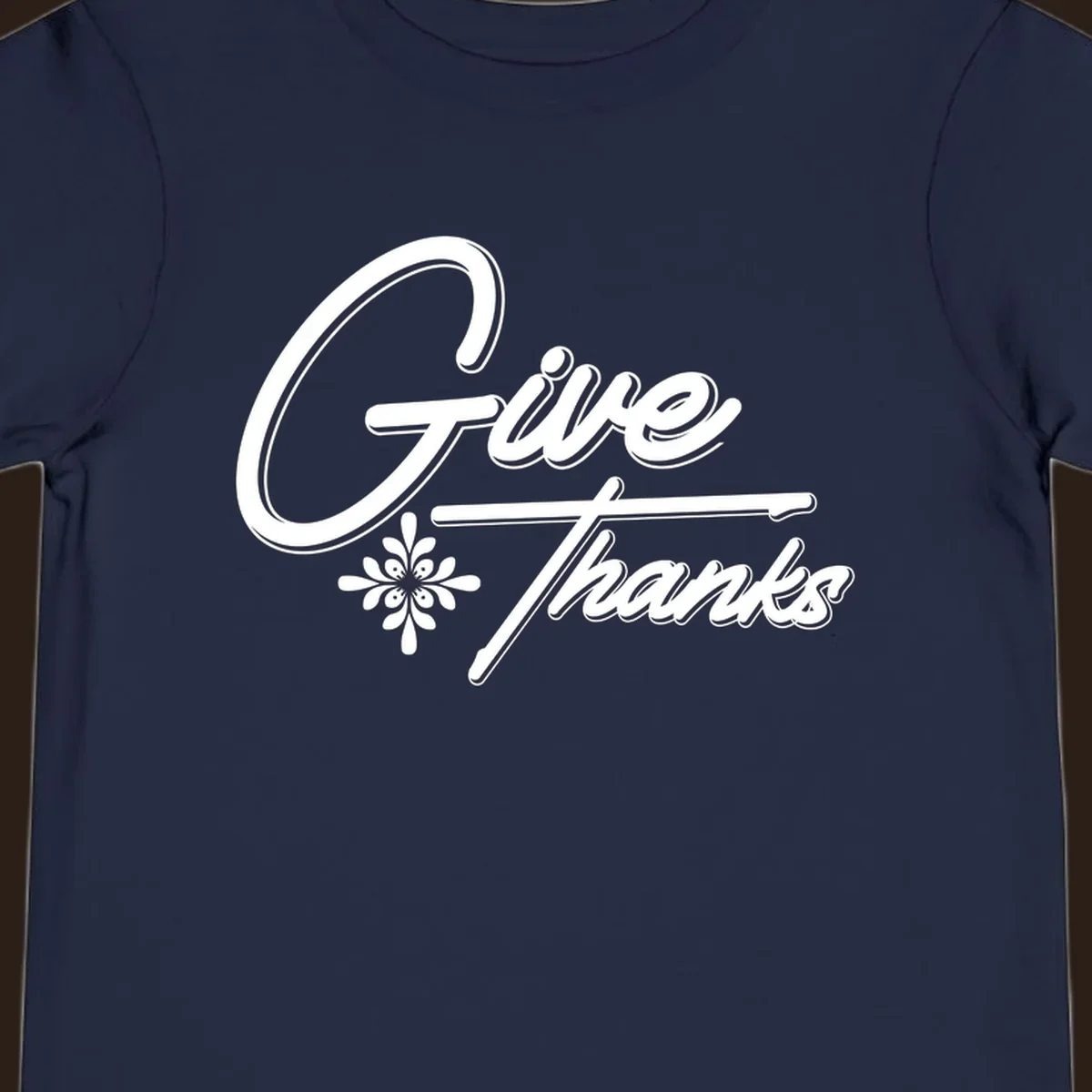 Give Thanks script text with floral accent for Thanksgiving shirts