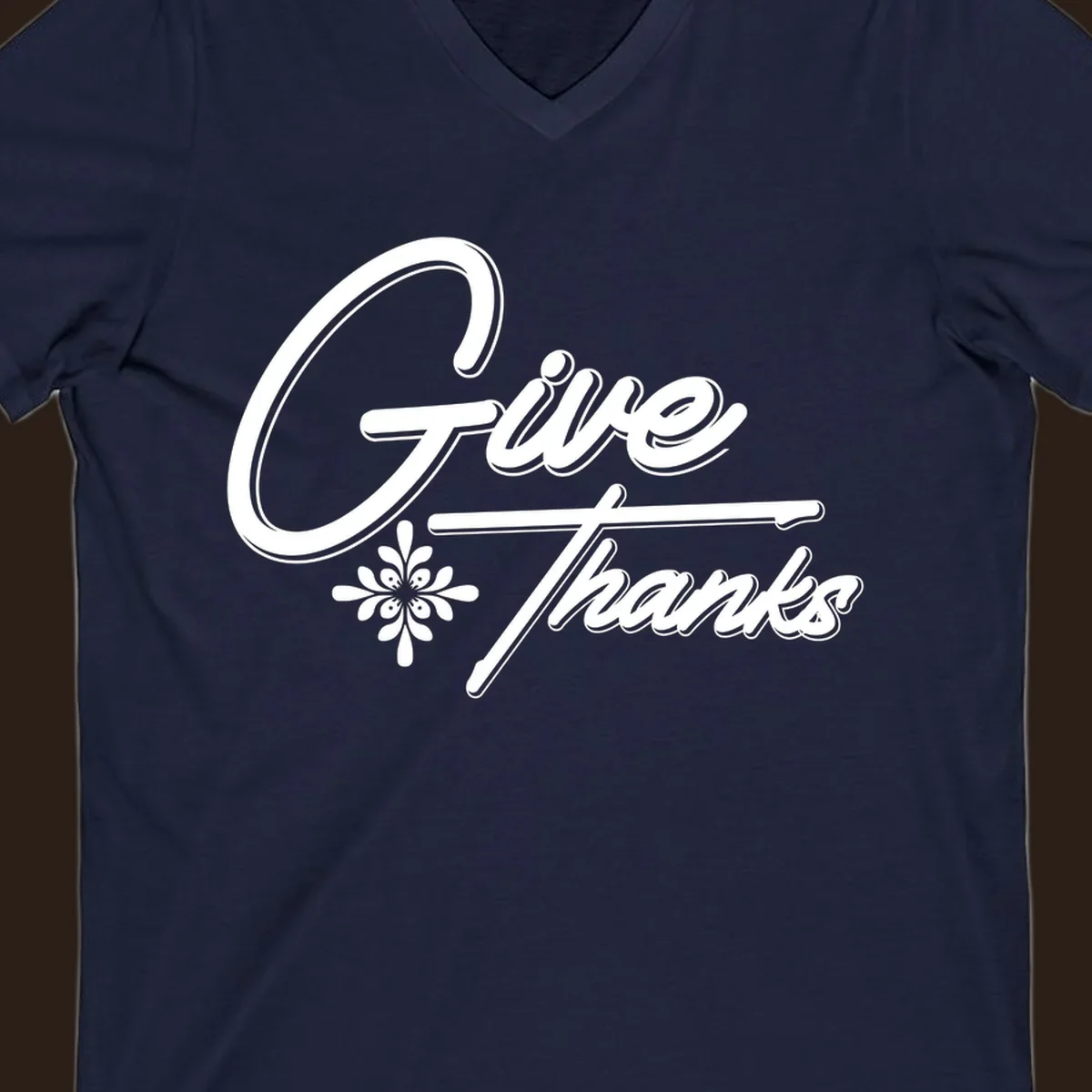 Give Thanks script text with floral accent for Thanksgiving shirts