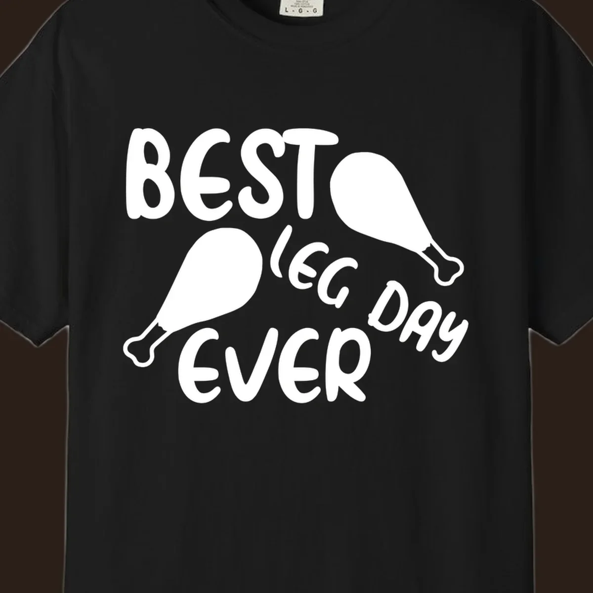 Best leg day ever text and chicken legs graphic.