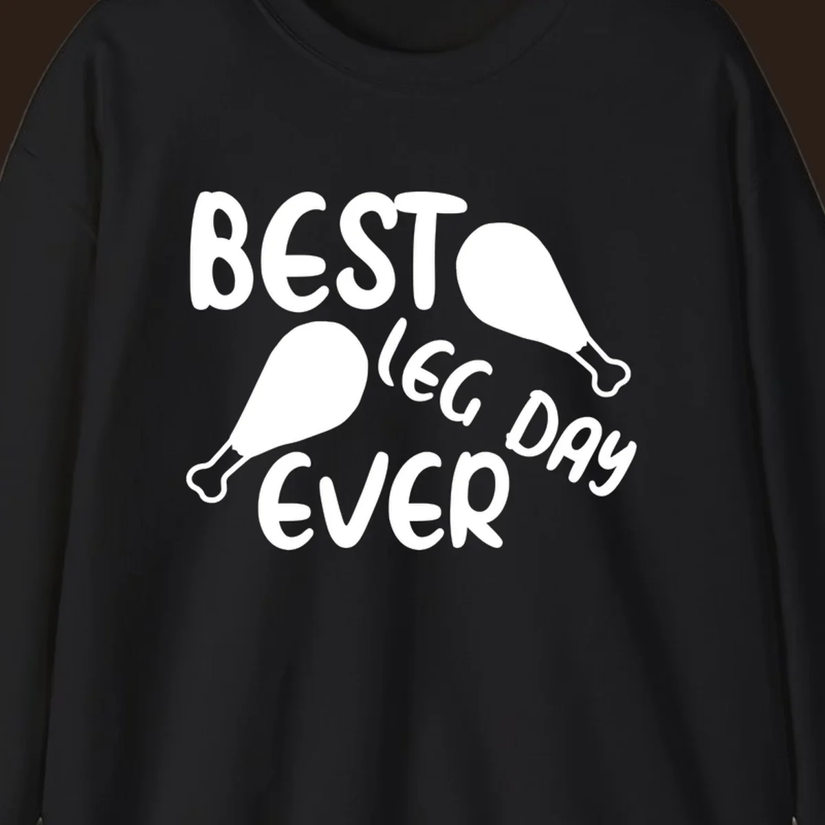 Best leg day ever text and chicken legs graphic.