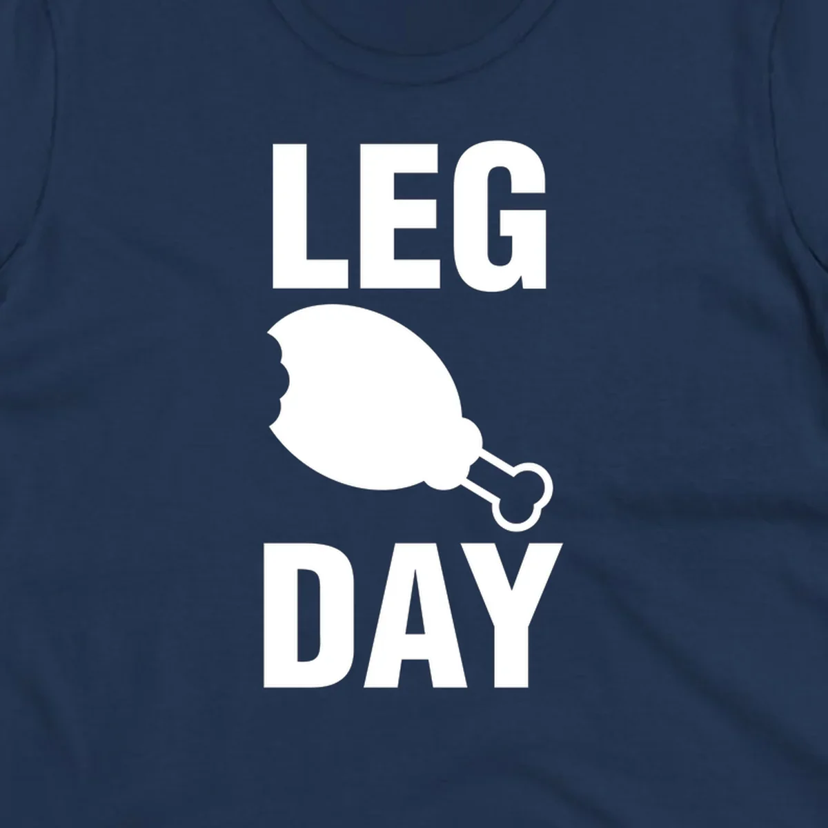 Leg Day text with a bitten chicken leg graphic. Humor fitness design.
