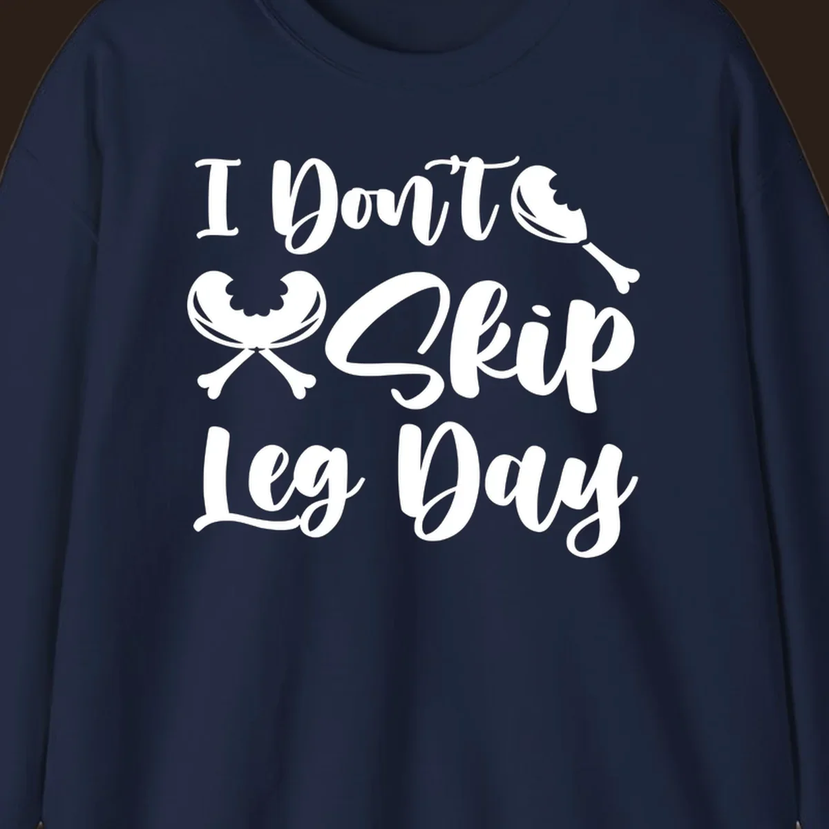 I Don't Skip Leg Day text with chicken leg graphics, funny Thanksgiving workout concept.