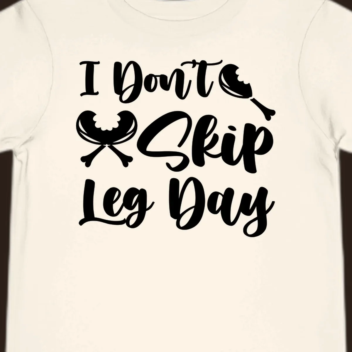 I Don't Skip Leg Day text with chicken leg graphics, funny Thanksgiving workout concept.