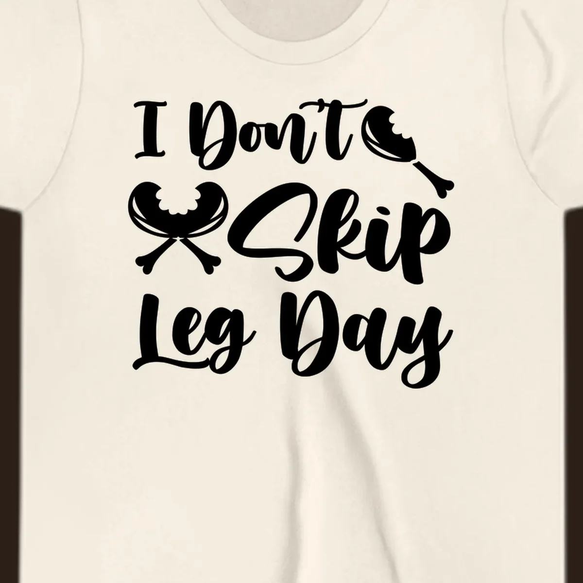 I Don't Skip Leg Day text with chicken leg graphics, funny Thanksgiving workout concept.