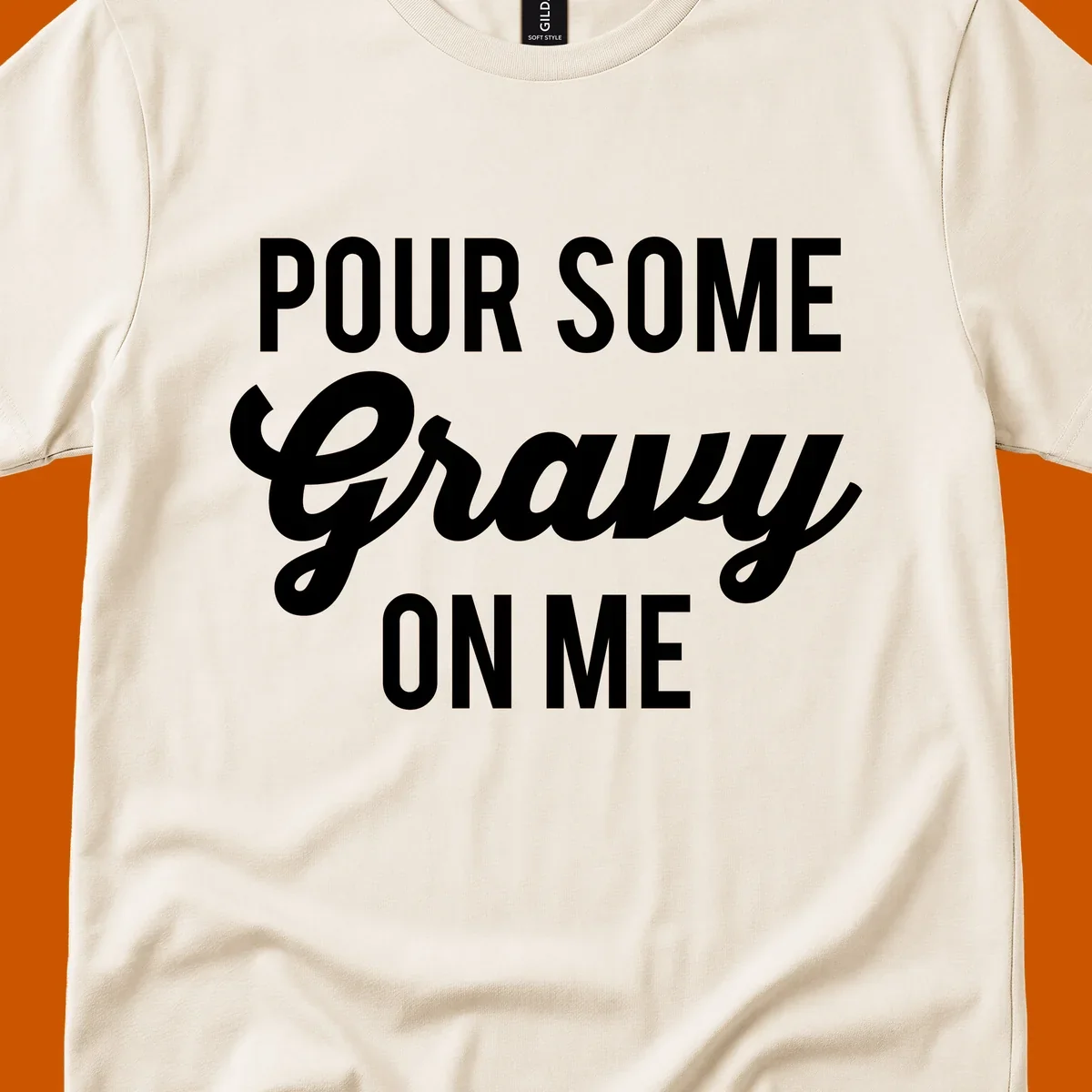 White text that says "POUR SOME Gravy ON ME" in a playful font, perfect for Thanksgiving.