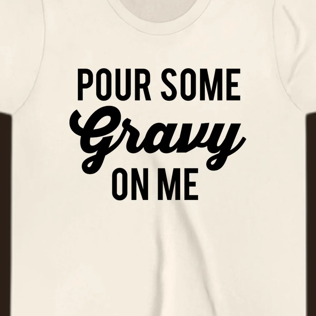 White text that says "POUR SOME Gravy ON ME" in a playful font, perfect for Thanksgiving.