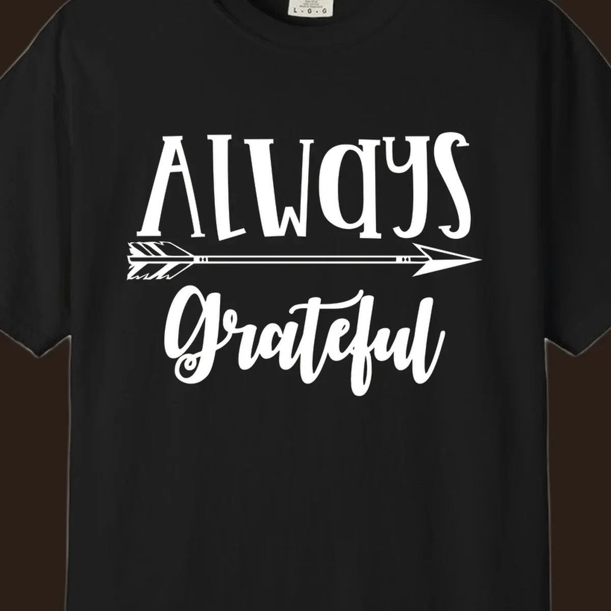 Always Grateful arrow design with white text on black and white backgrounds.