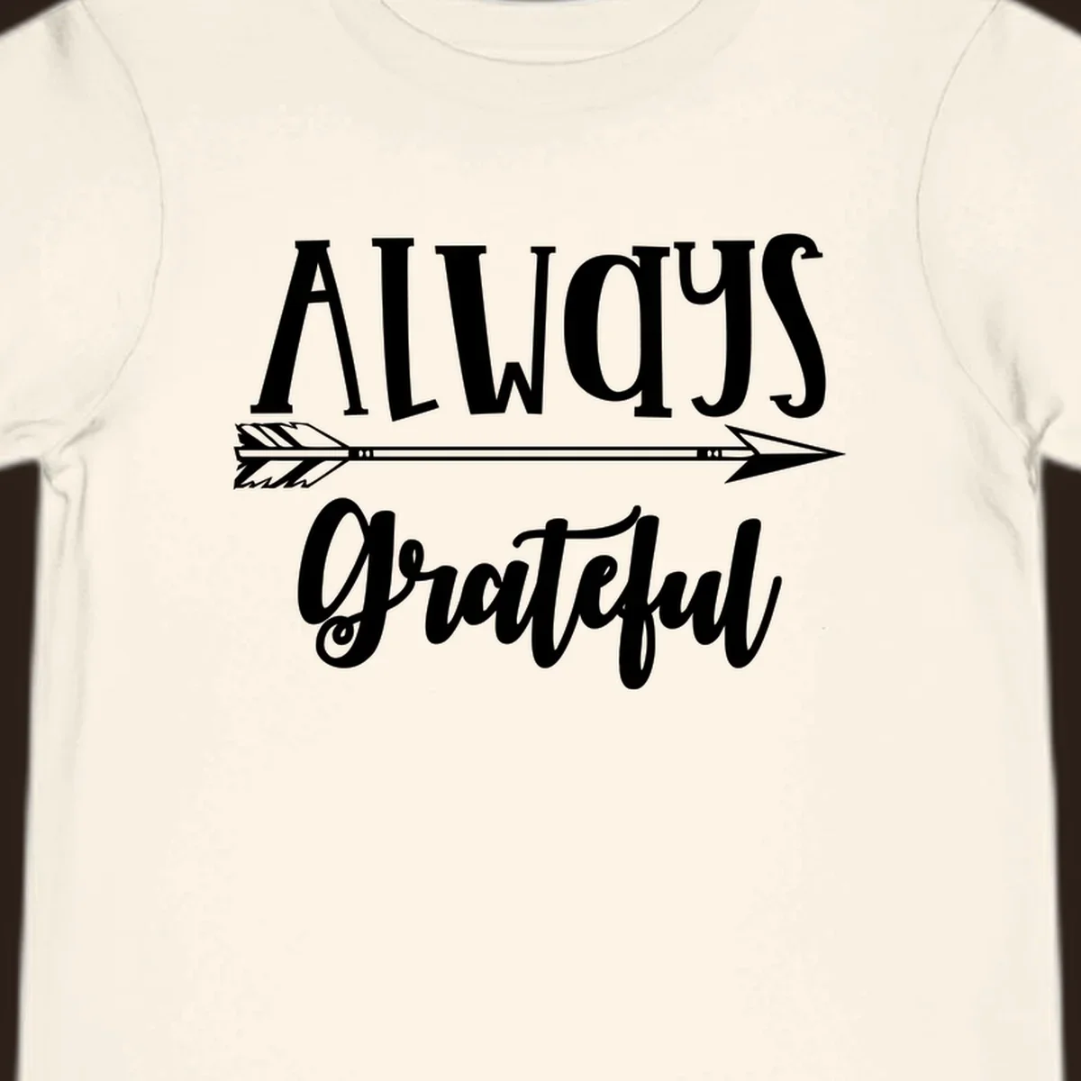 Always Grateful arrow design with white text on black and white backgrounds.