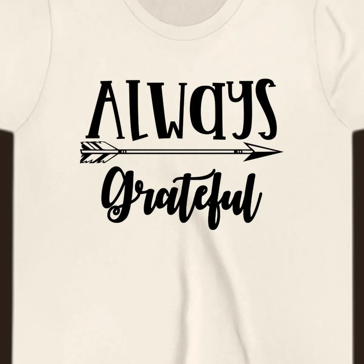 Always Grateful arrow design with white text on black and white backgrounds.