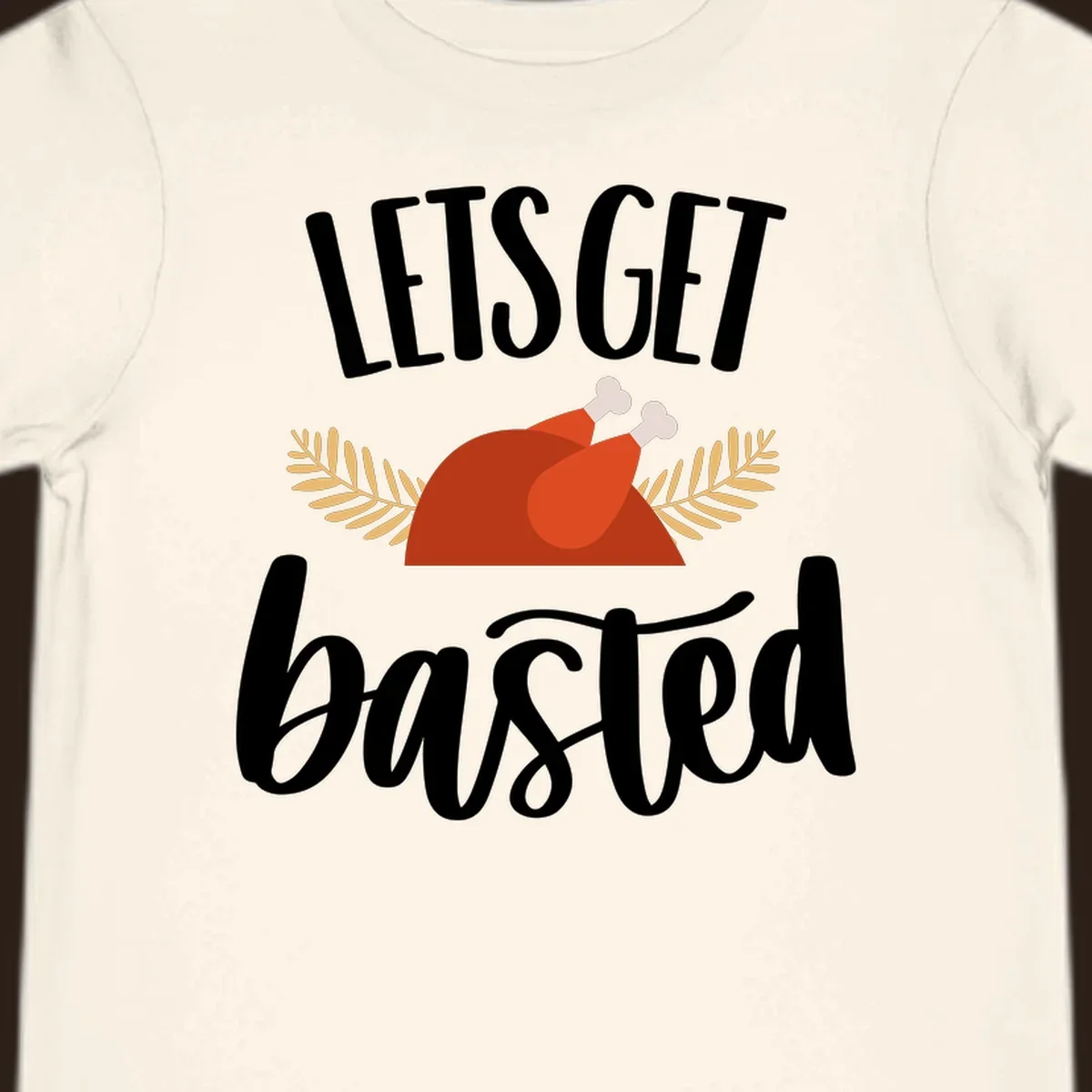 Lets Get Basted Thanksgiving Turkey design with playful text and a roasted turkey illustration.
