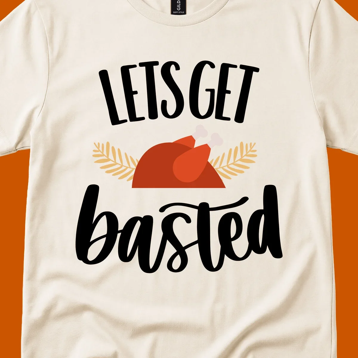 Lets Get Basted Thanksgiving Turkey design with playful text and a roasted turkey illustration.