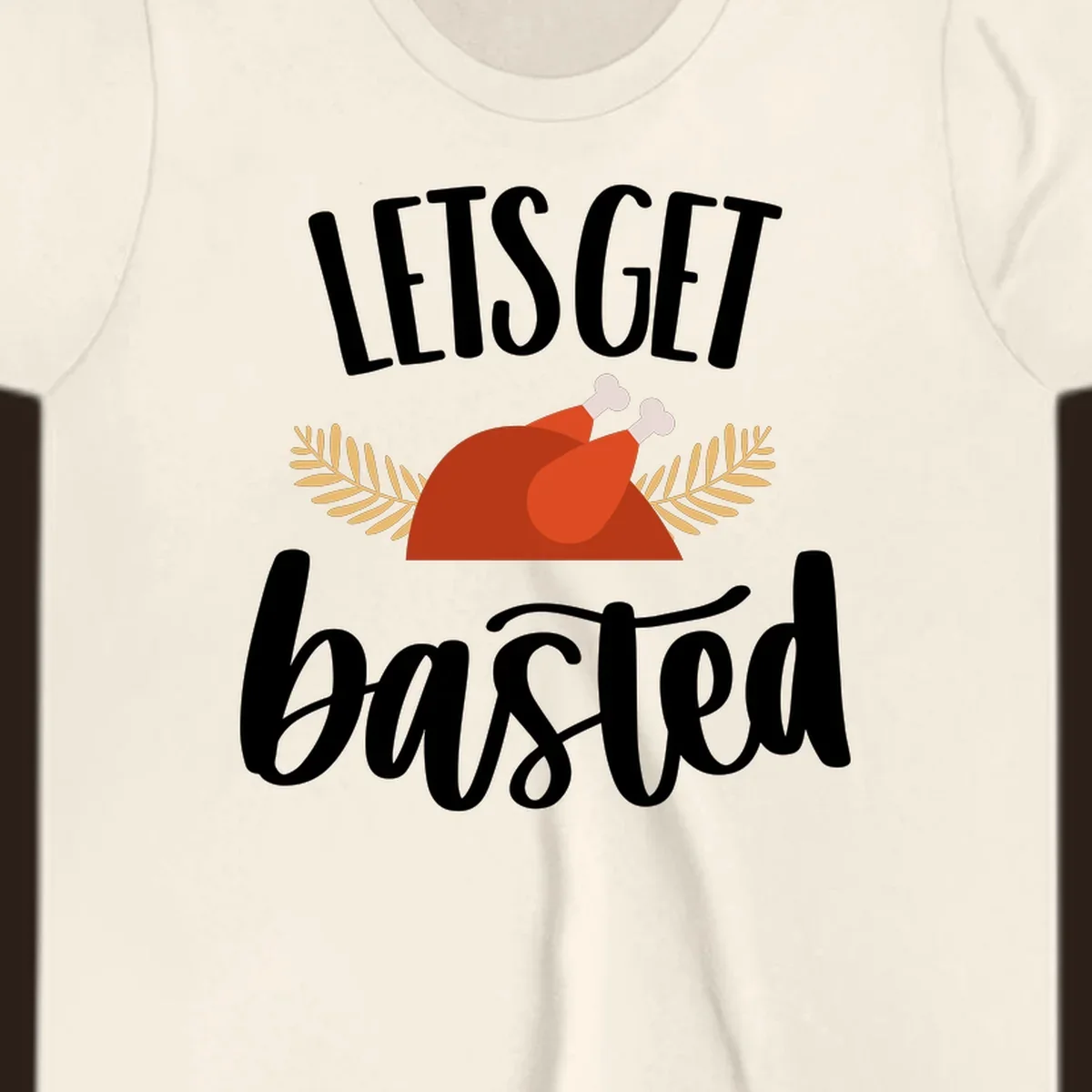 Lets Get Basted Thanksgiving Turkey design with playful text and a roasted turkey illustration.