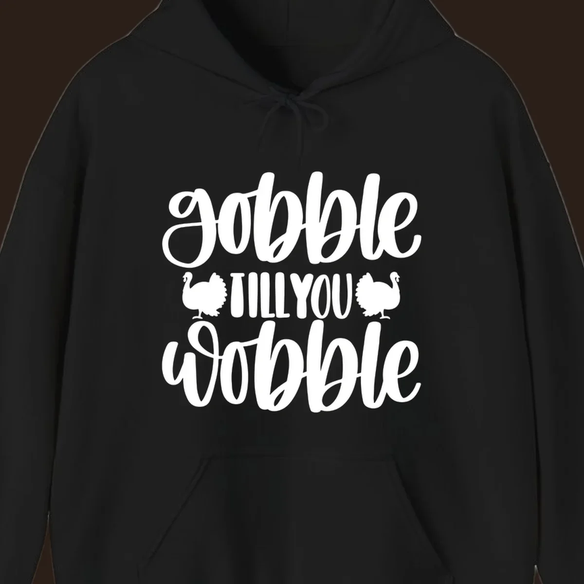 Gobble till you wobble text with turkey illustrations, Thanksgiving design.