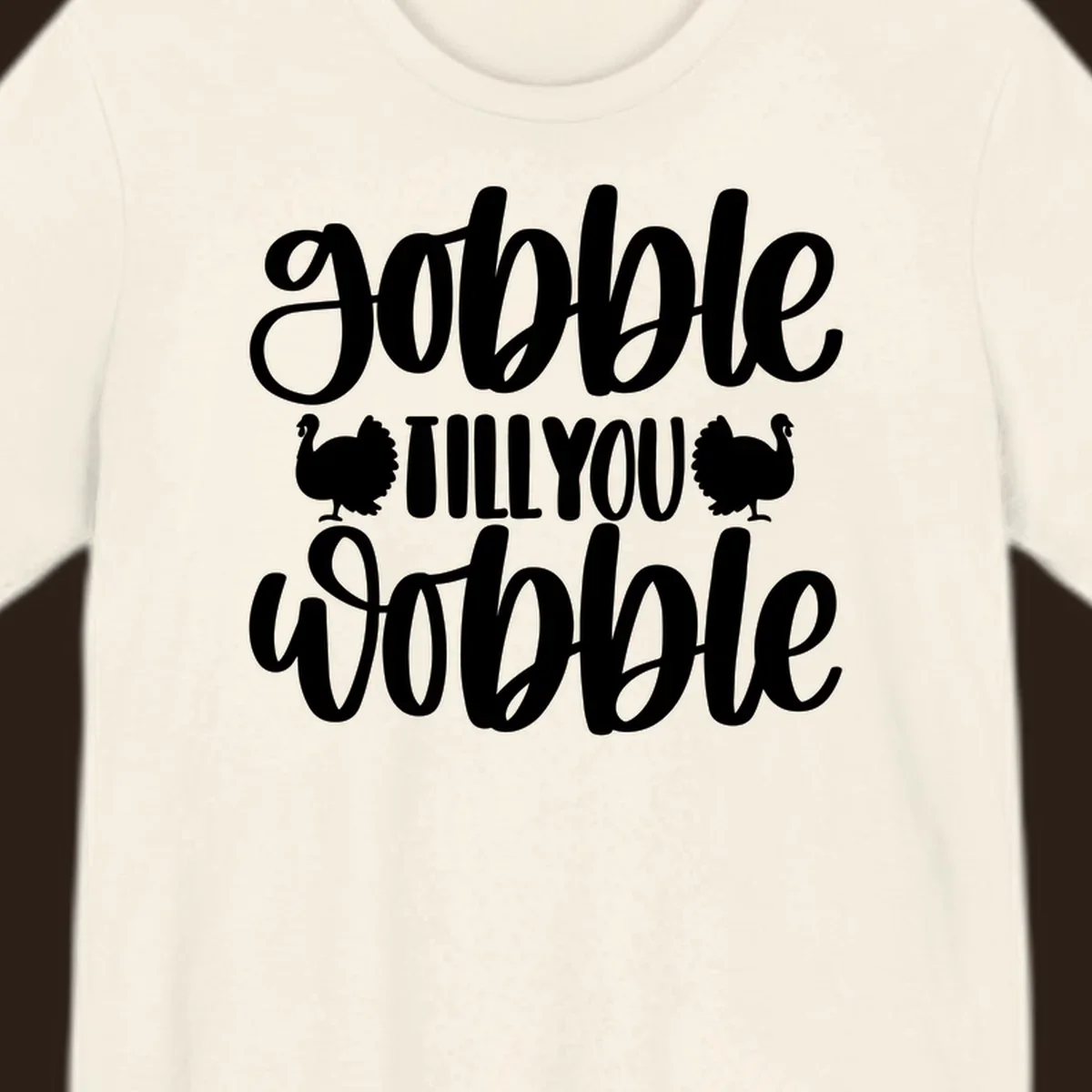 Gobble till you wobble text with turkey illustrations, Thanksgiving design.