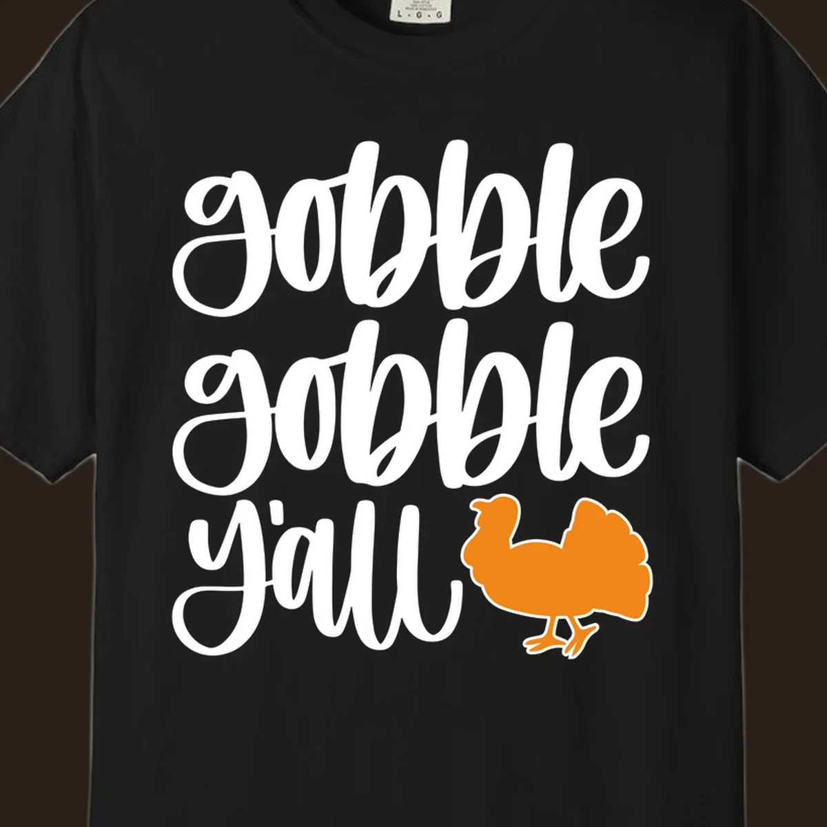 Gobble gobble y'all text with a turkey illustration, gobble-gobble-turkey Thanksgiving design.