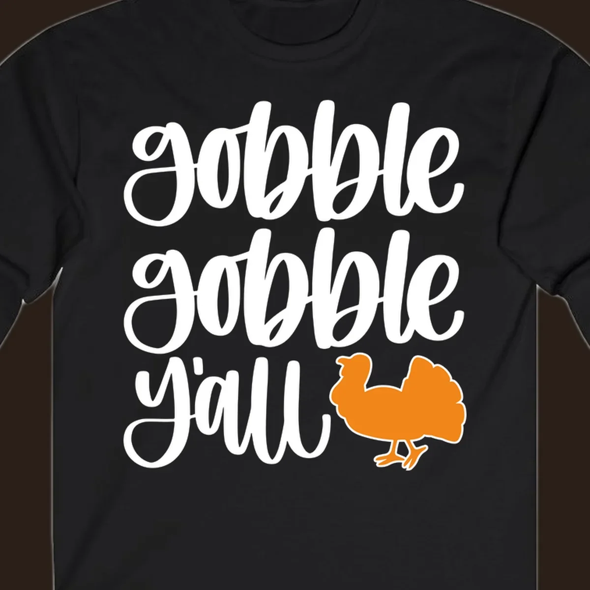 Gobble gobble y'all text with a turkey illustration, gobble-gobble-turkey Thanksgiving design.